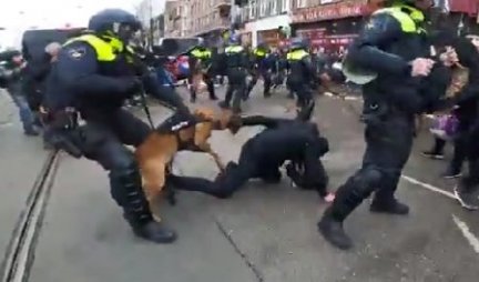 OVAKO TO RADI POLICIJA U SRCU EVROPE! Krvoločni psi rastržu protestante, policija bez milosti pendreči žene, ŠOK SCENE na protestu u AMSTERDAMU! (UZNEMIRUJUĆI VIDEO)
